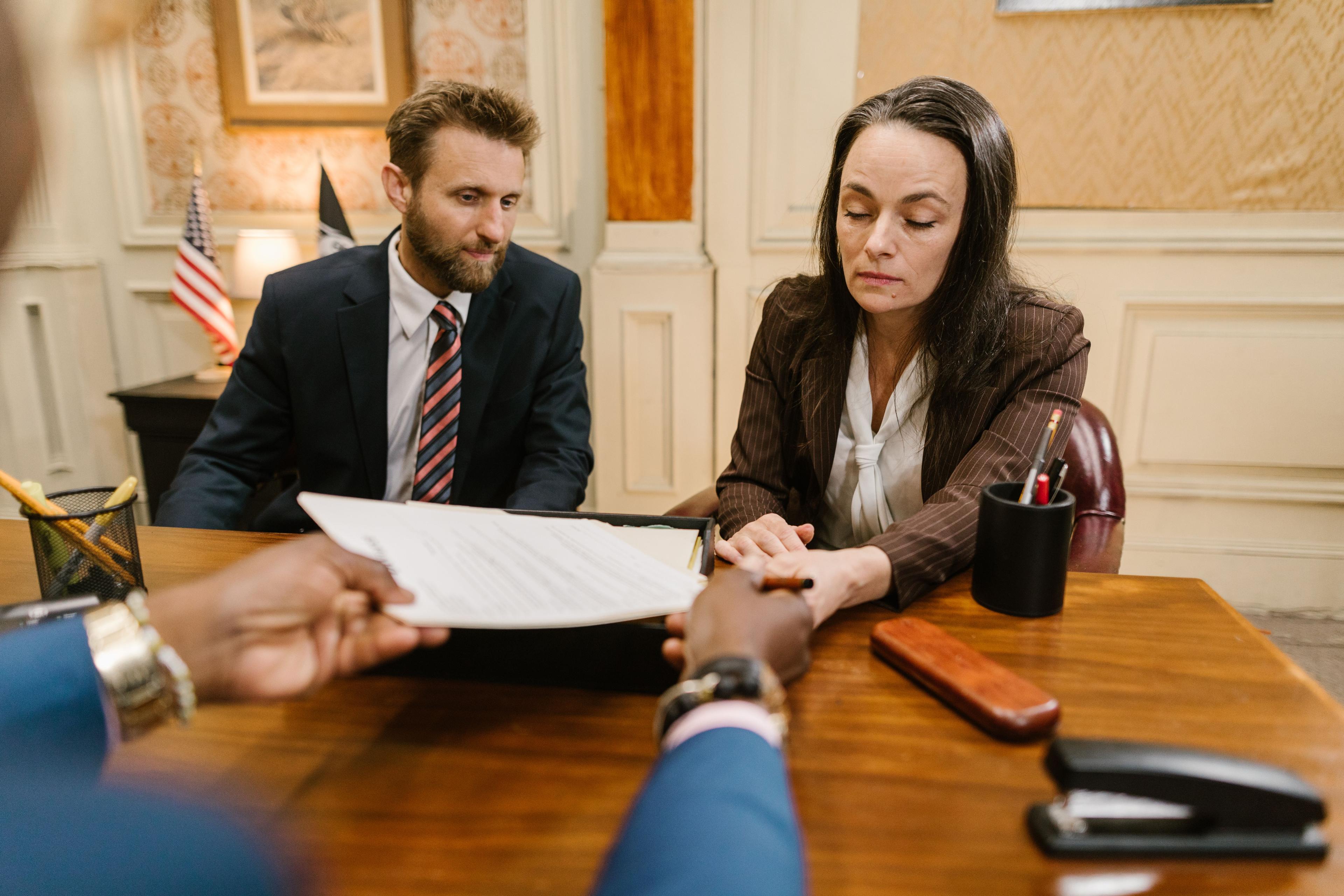 Career documents changing hands during a representation engagement